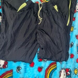 Black and green stripe pants size small in woman’s very stretchy can fit medium